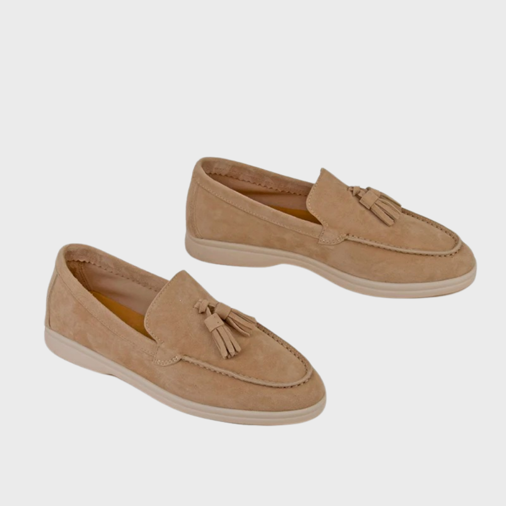 Men's black slip-on dress loafers with sleek silhouette and effortless professional style
