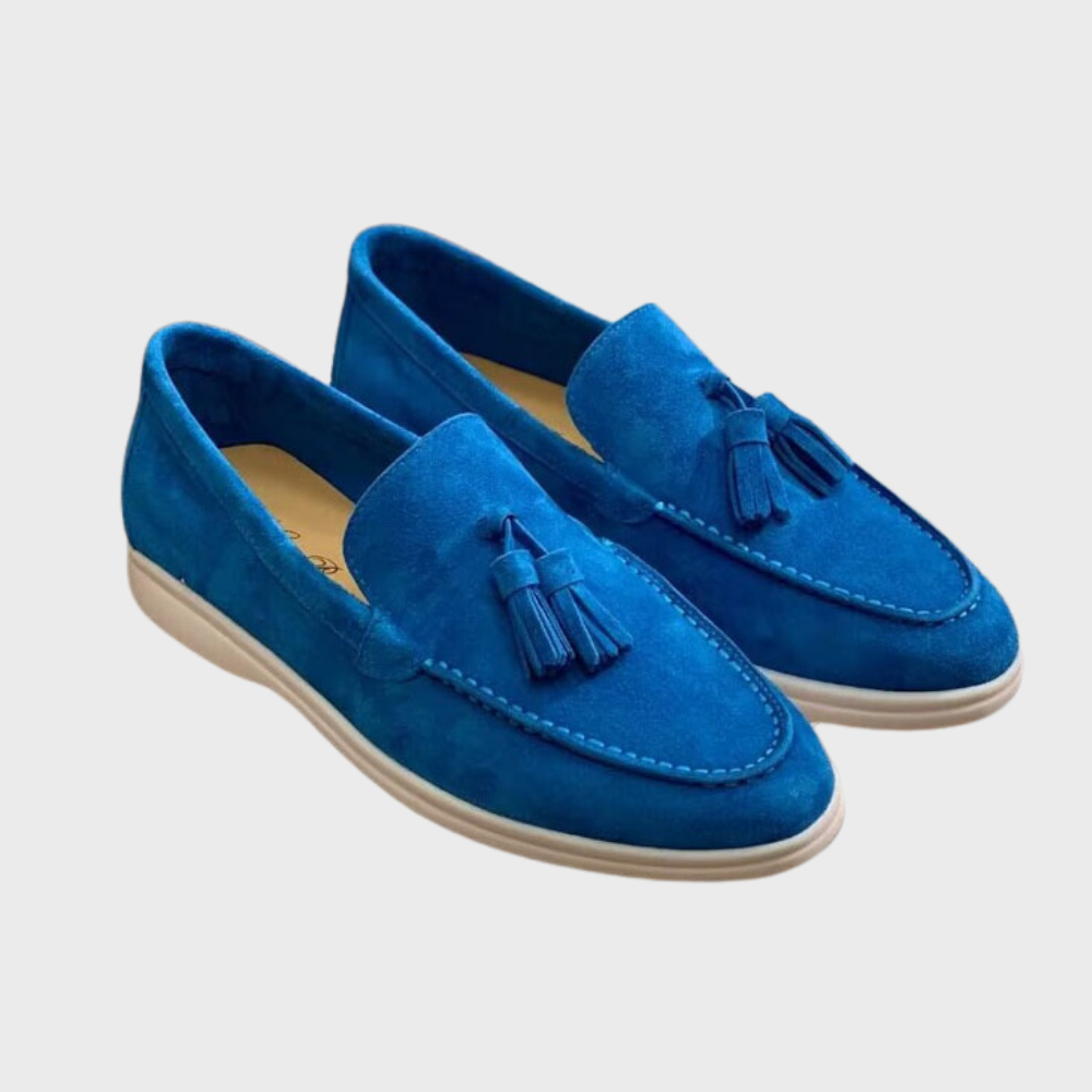 Men's black slip-on dress loafers with sleek silhouette and effortless professional style