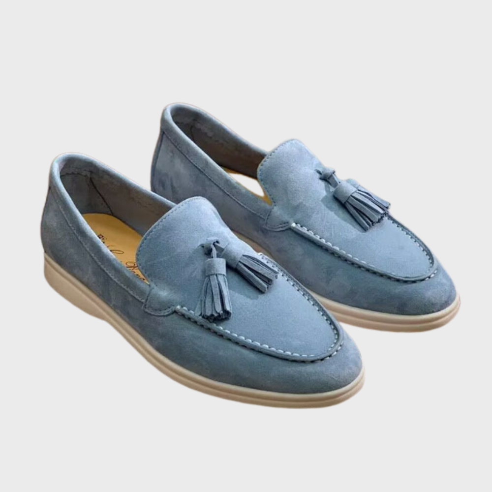 Men's black slip-on dress loafers with sleek silhouette and effortless professional style
