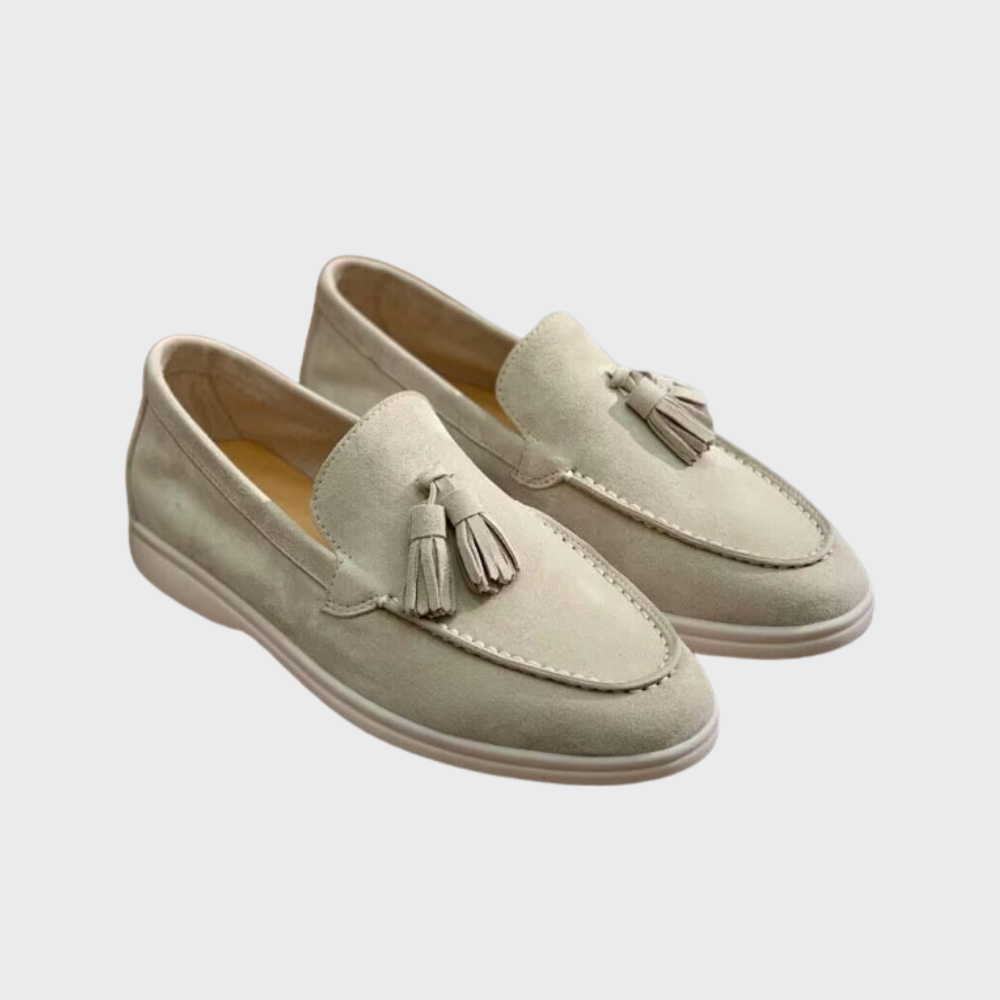 Men's black slip-on dress loafers with sleek silhouette and effortless professional style