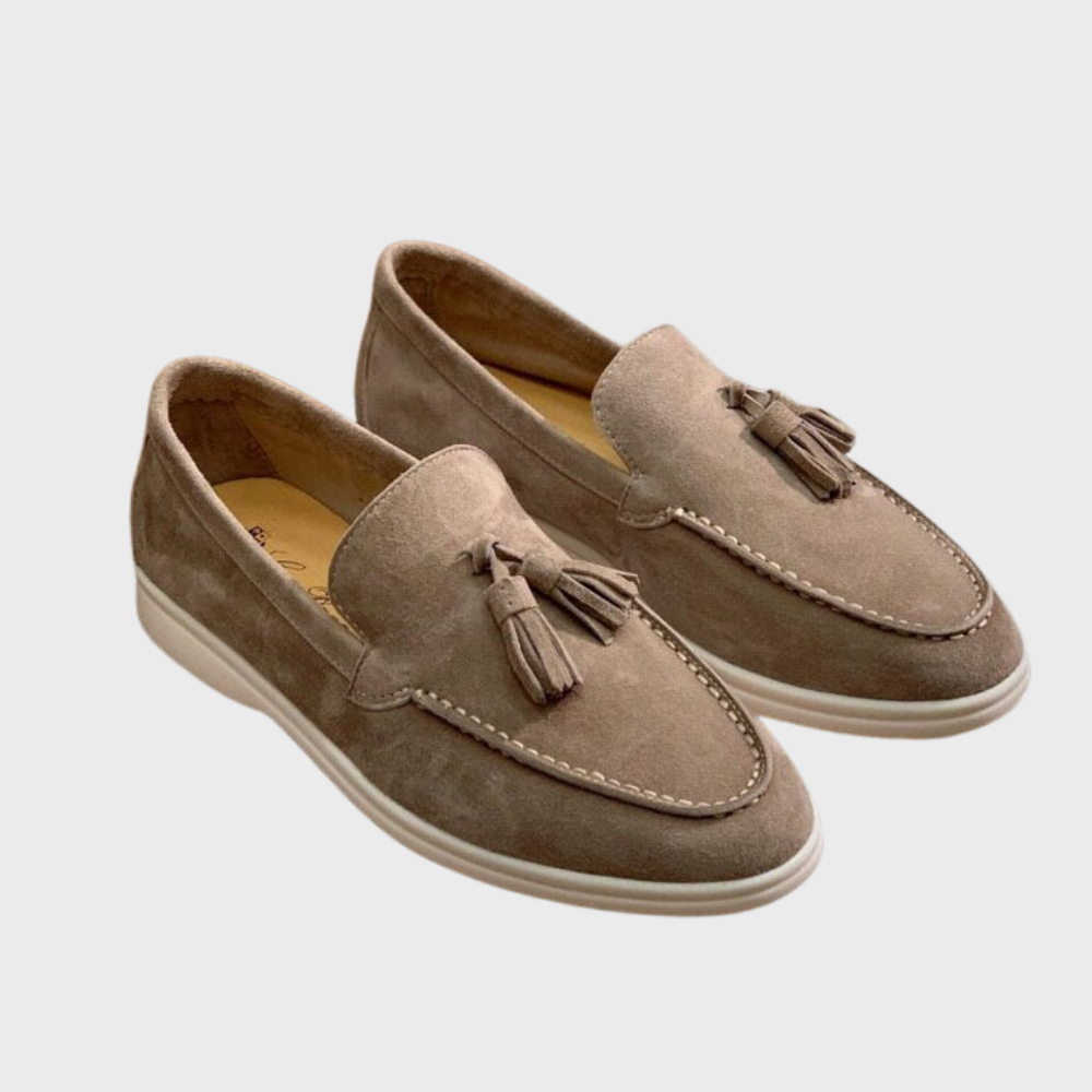 Men's black slip-on dress loafers with sleek silhouette and effortless professional style