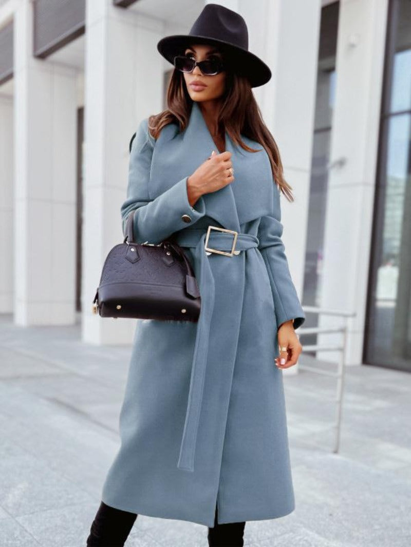 Elegant women's maxi coat in A-line silhouette with high collar, fashion-forward outerwear style