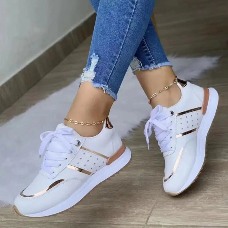 Women's lightweight casual sneakers in white minimalist design with cushioned sole for all-day comfort