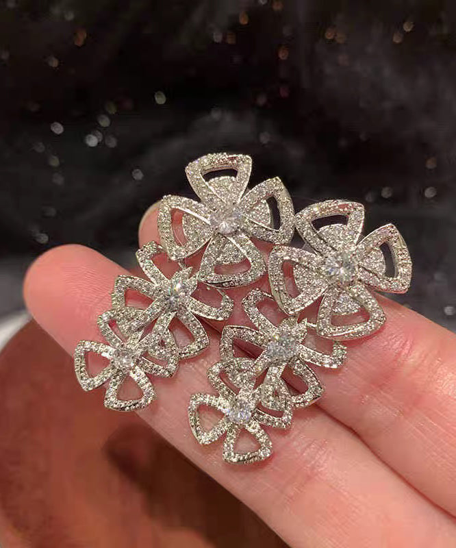 Boucles d'oreilles à tige décontractées en acier inoxydable blanc avec zircon et nœud creux - Urbann-Vibe