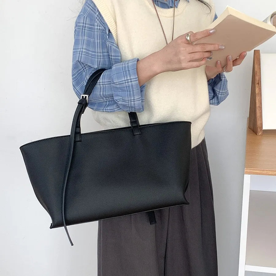 Soft pastel yellow casual tote bag with dual handles and detachable shoulder strap for everyday use