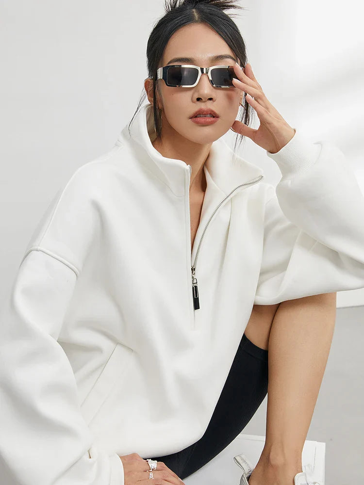 Unisex oversized half-zip pullover hoodie with stand collar for relaxed layering comfort