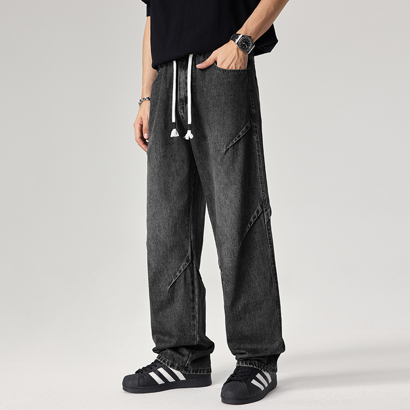 Caulfield relaxed-fit denim joggers in distressed wash with angular seam detailing for urban style