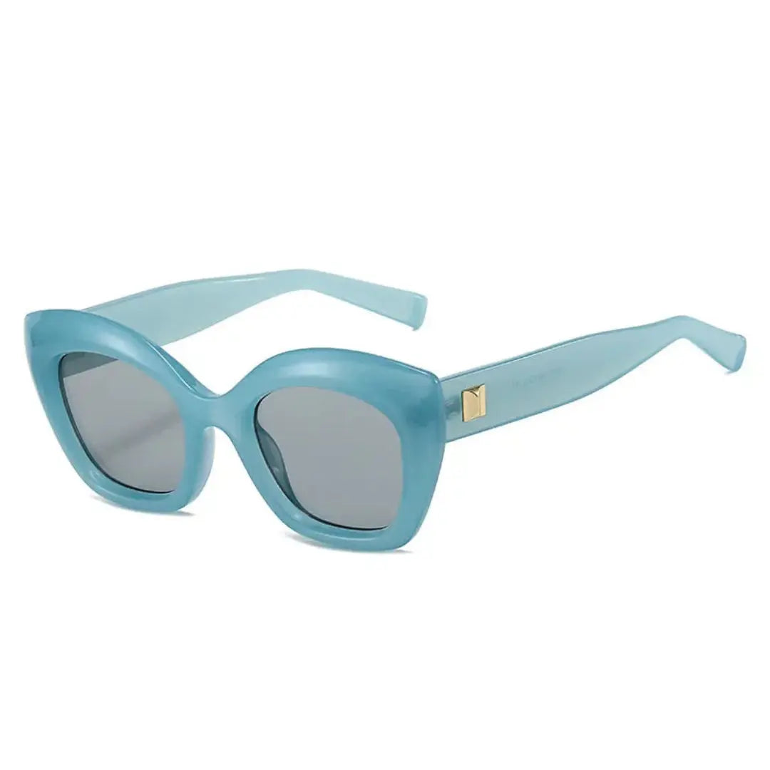 Women's bold sculpted cat-eye sunglasses with UV400 lenses, timeless feminine statement style