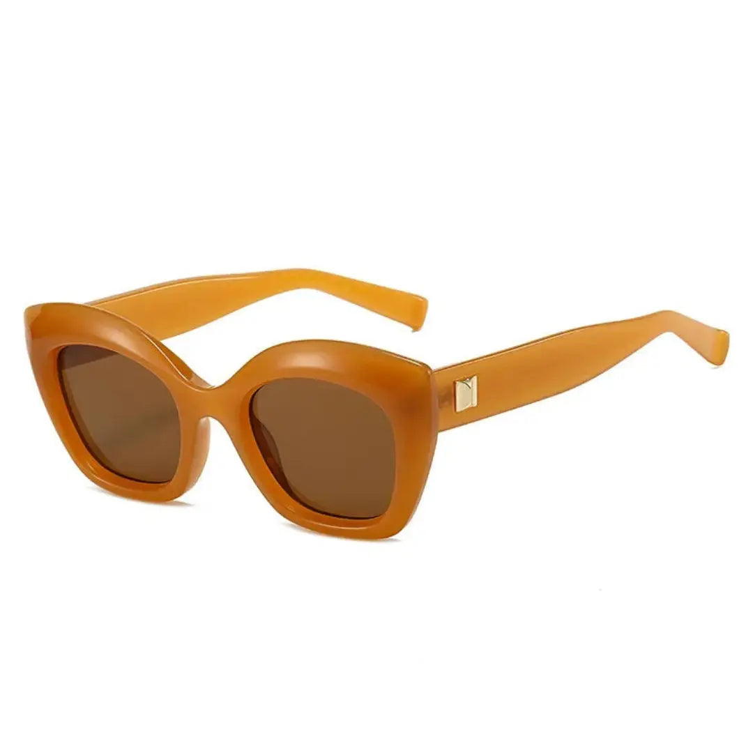 Women's bold sculpted cat-eye sunglasses with UV400 lenses, timeless feminine statement style