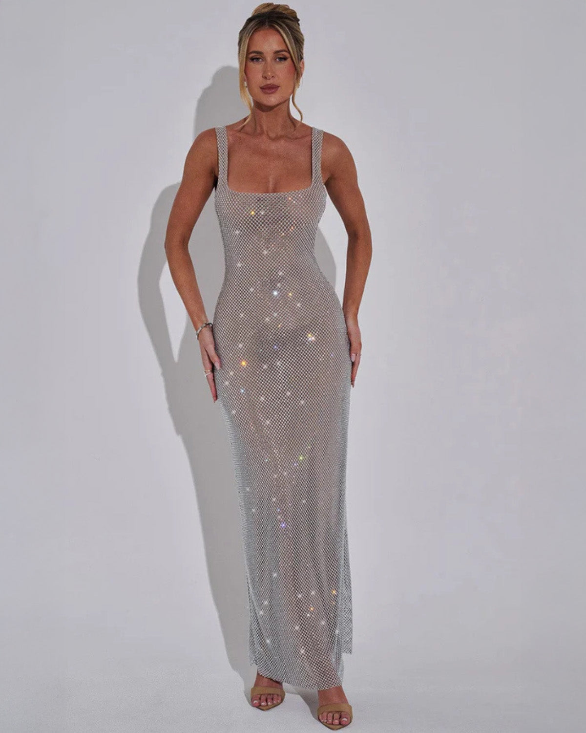 Red figure-hugging sequin evening gown with sculpted silhouette for red carpet glamour