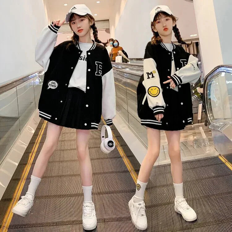 Girls navy blue varsity jacket with classic silhouette and contrast sleeve detail for school