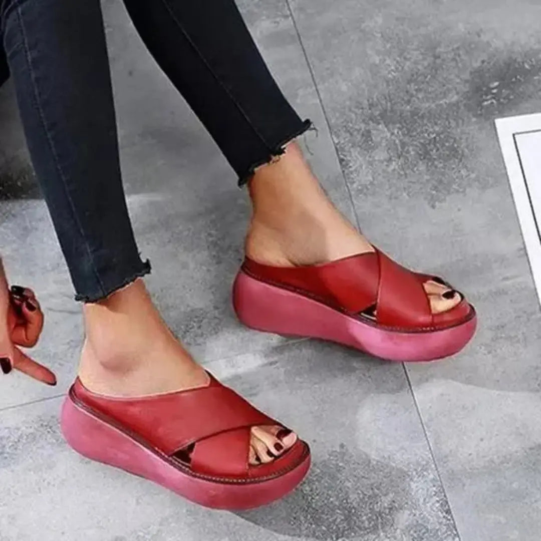 Women's beige cross-strap platform sandals with cushioned footbed and open-toe casual design
