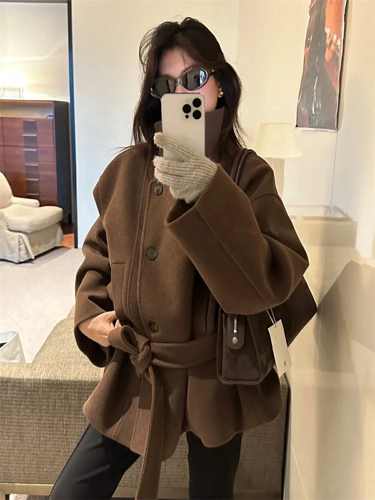 Women's textured high collar winter coat modern silhouette versatile elegant outerwear