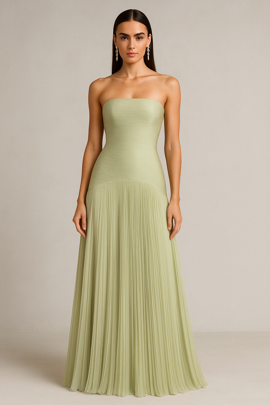 Ivory strapless pleated maxi dress with structured bodice and flowing skirt for wedding guests