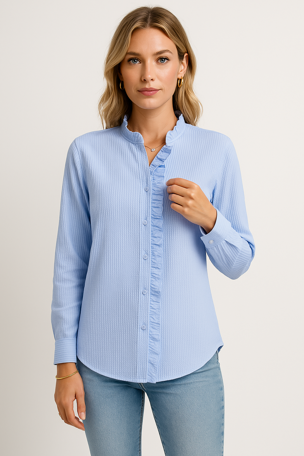 Women's relaxed-fit textured blouse with long sleeves and ruffle edge detail for effortless style