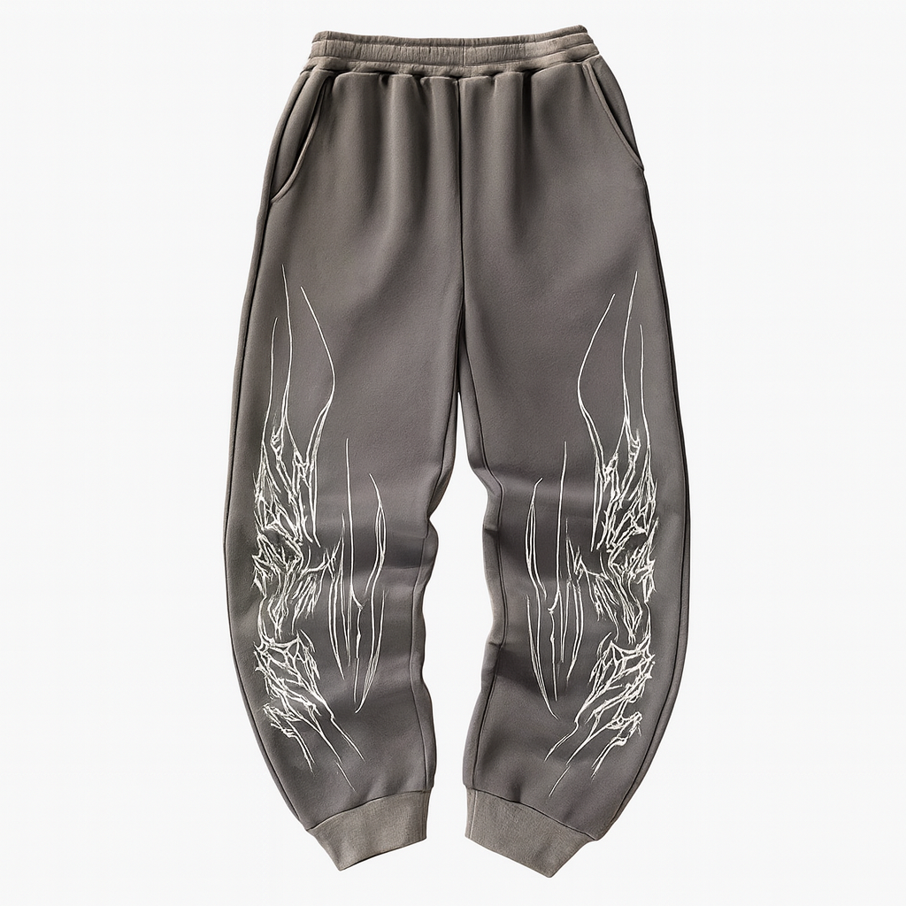 Black relaxed fit sweatpants tapered cuffs razor wire leg graphics streetwear cotton comfort