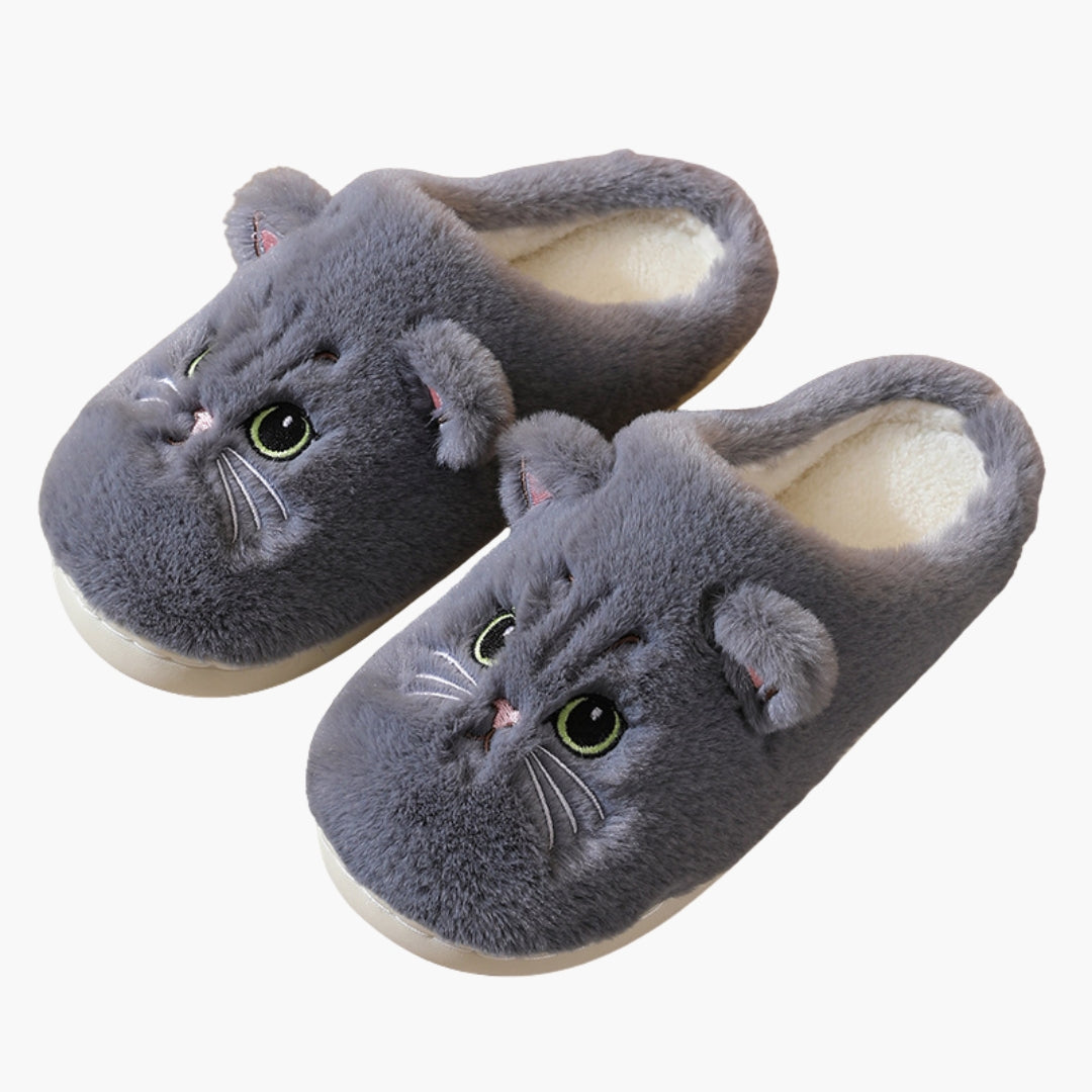 Women's cozy closed-toe slip-on slippers with embroidered cat face featuring ears, whiskers, and eyes