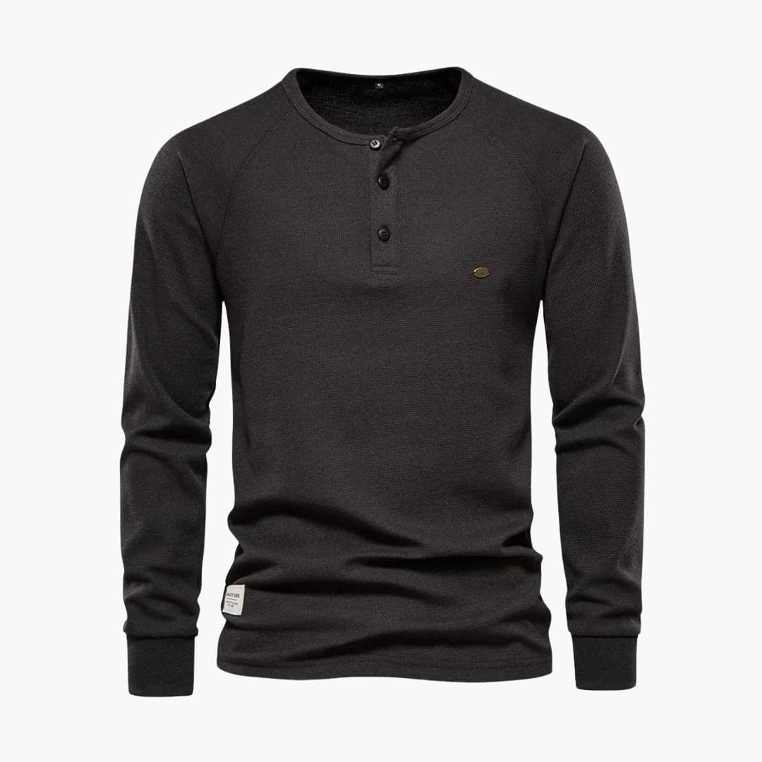 Men's textured long-sleeve shirt with button placket, fitted cuffs, smart casual style
