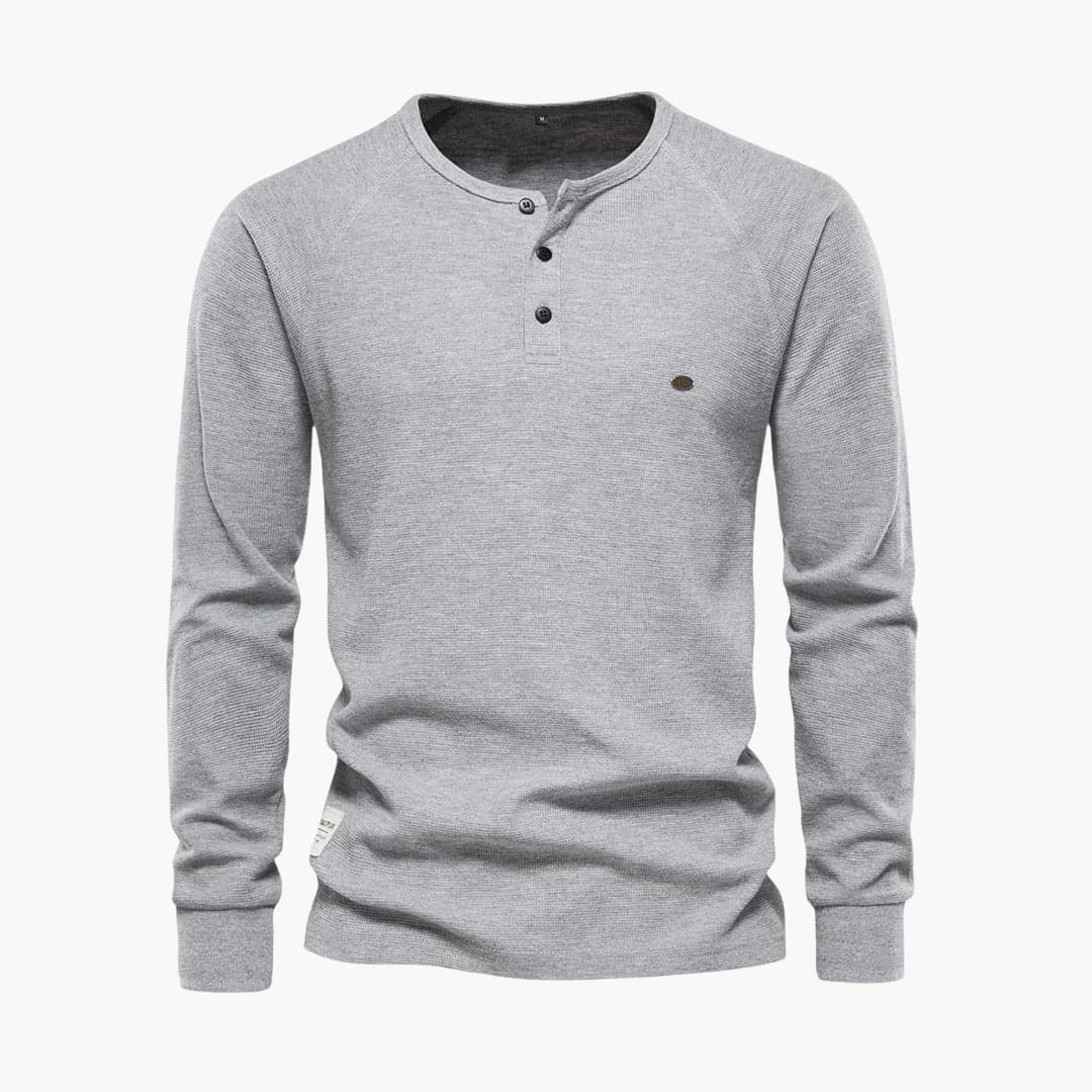 Men's textured long-sleeve shirt with button placket, fitted cuffs, smart casual round neckline style