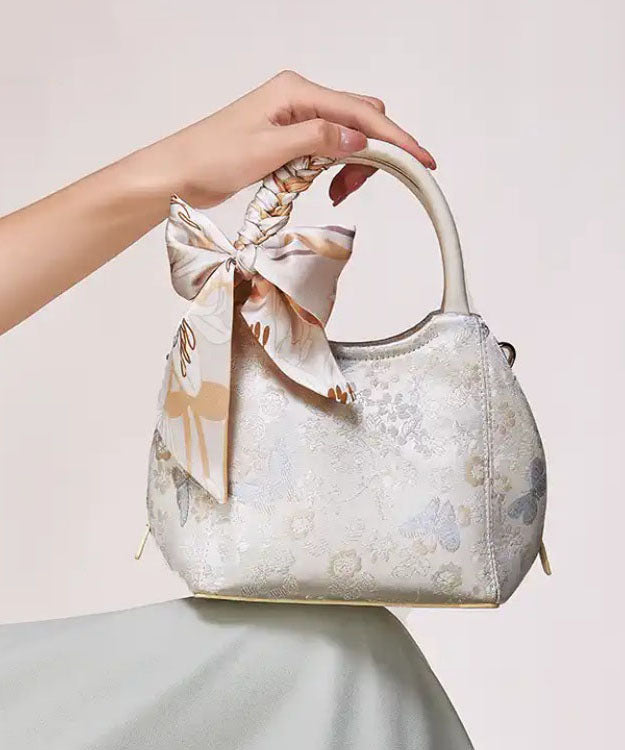 Sac fourre-tout chic en coton jacquard beige avec nœud - Urbann-Vibe