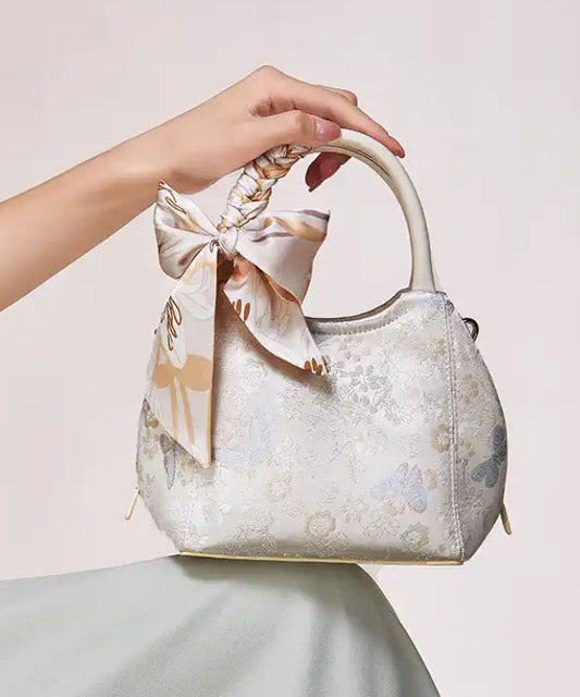Sac fourre-tout chic en coton jacquard beige avec nœud - Urbann-Vibe