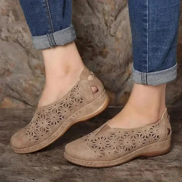 Women's beige cut-out slip-on shoes with low wedge heel and cushioned insole for all-day comfort