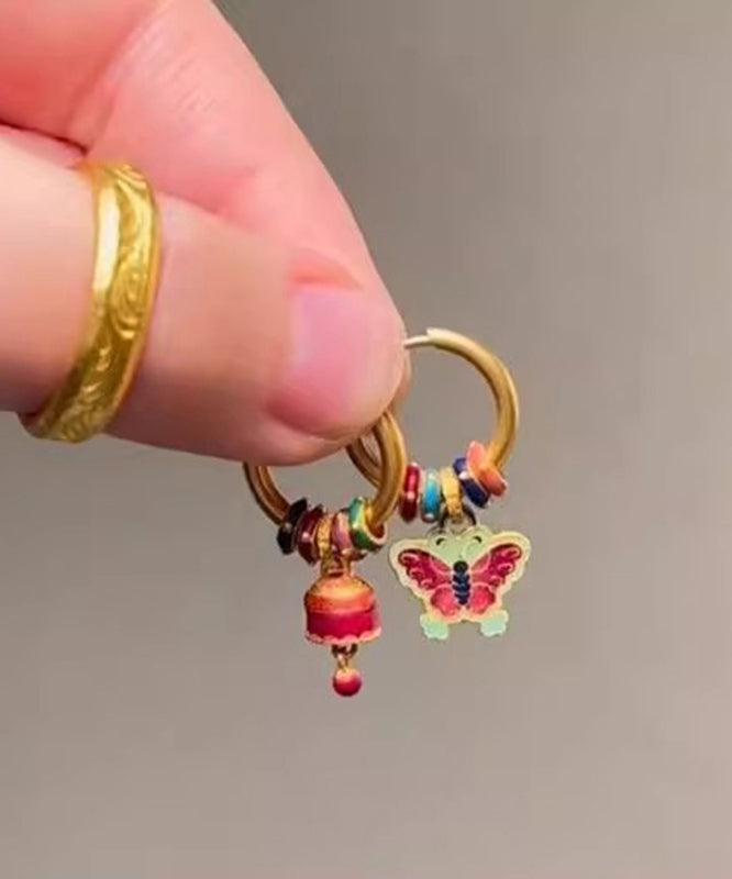 Boucles d'oreilles pendantes asymétriques en forme de cloche papillon en or antique chic - Urbann-Vibe