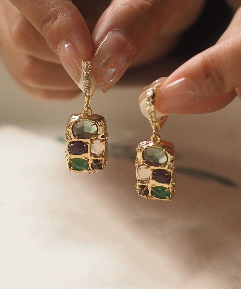 Boucles d'oreilles pendantes chics en or et cuivre doré avec pampilles en pierres précieuses - Urbann-Vibe