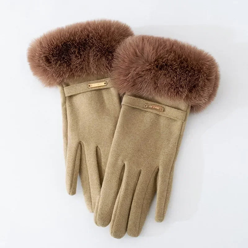Women's black fitted gloves with plush cuff and gold metal accent, refined fall winter essential