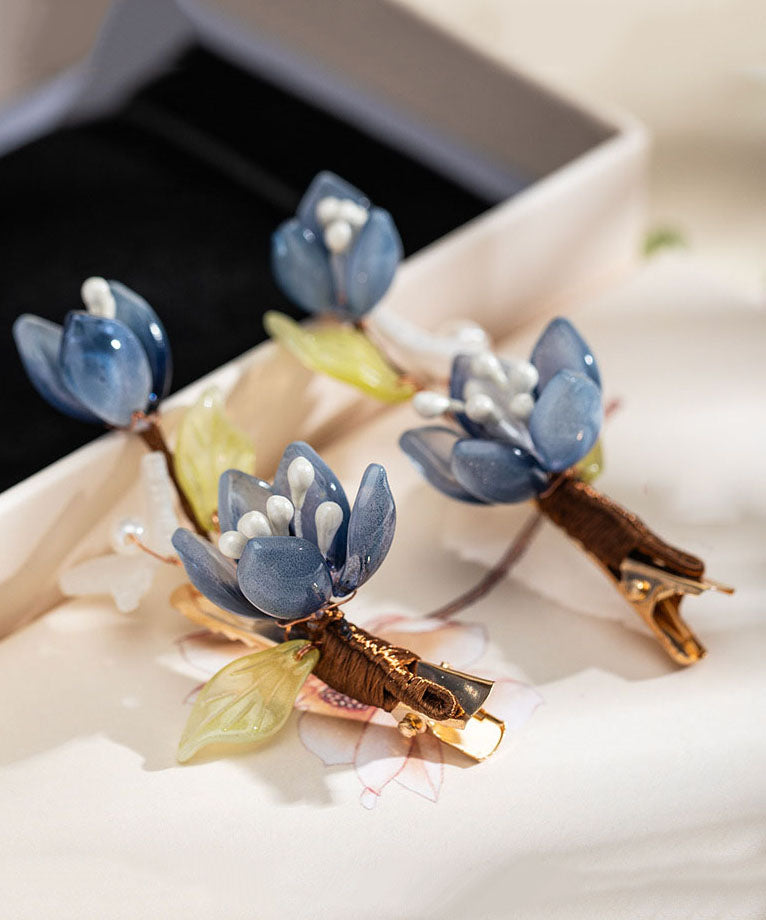 Paire d'épingles à cheveux lotus en cuivre bleu doré de style chinois, à glaçure nacrée. - Urbann-Vibe