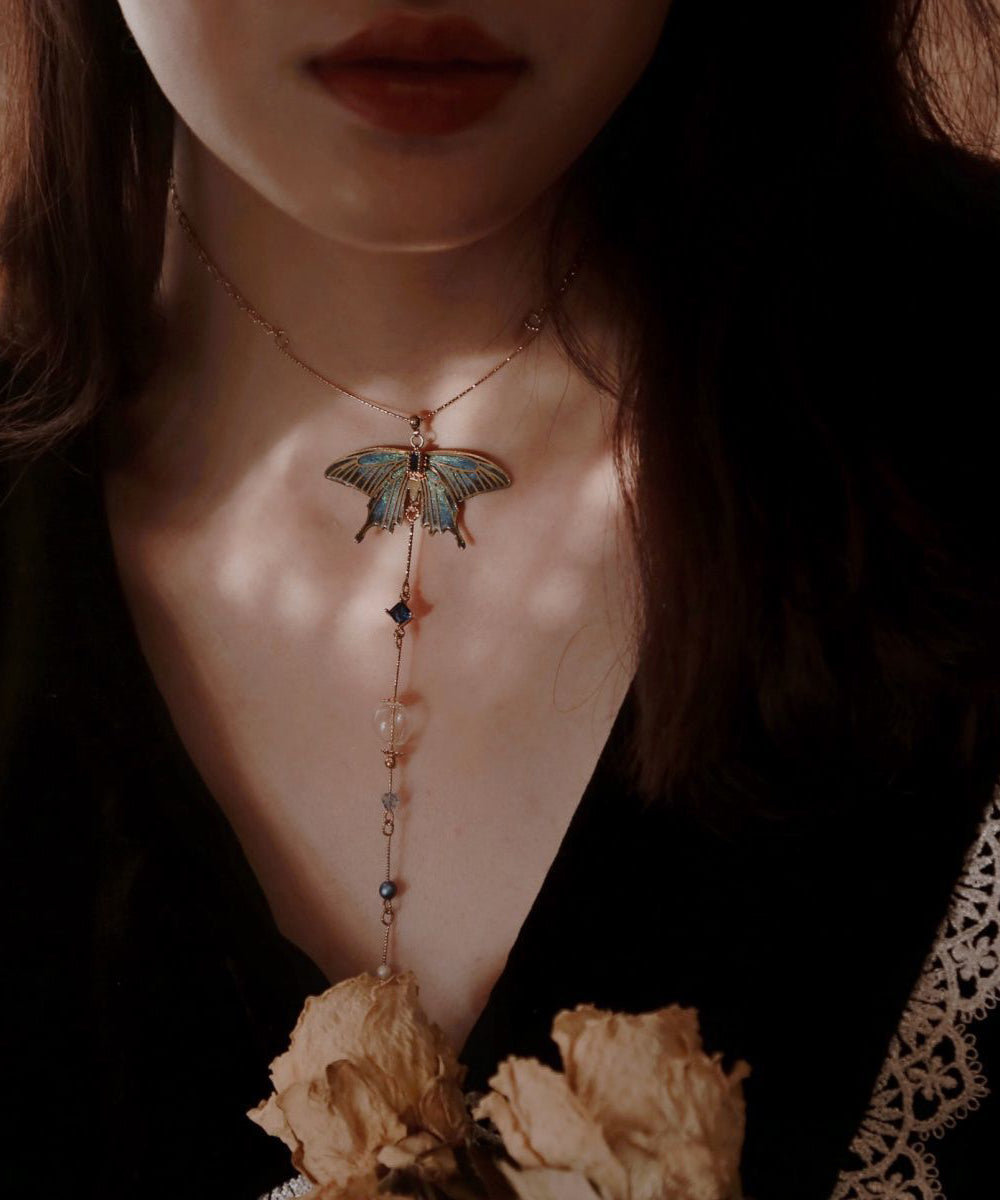 Collier avec pendentif en forme d'aile en perles de verre et zircon doré de style chinois - Urbann-Vibe
