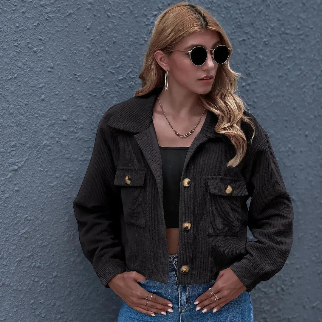 Chloe cropped corduroy jacket in neutral tone, collared button-up with structured chest pockets, vintage-inspired fit
