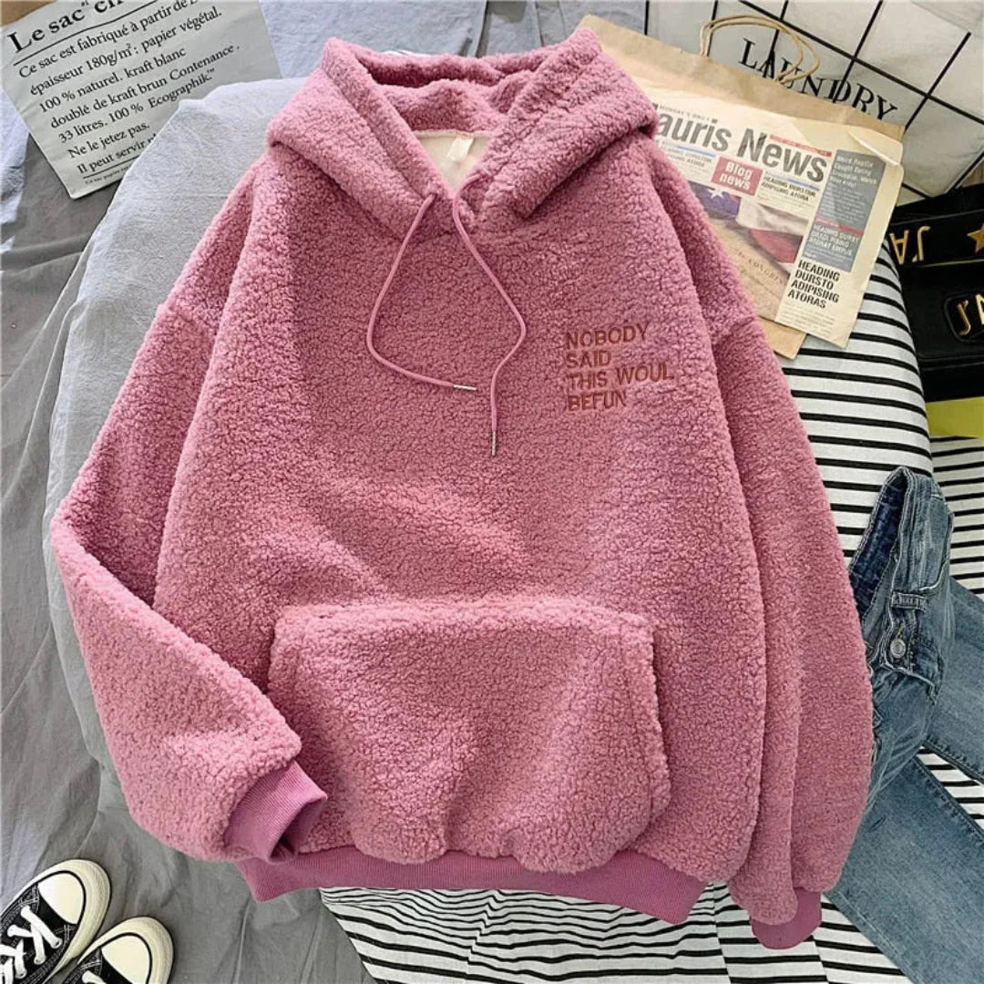 Women's oversized fleece hoodie in cozy neutral tones with embroidered detail, ultra-soft relaxed fit