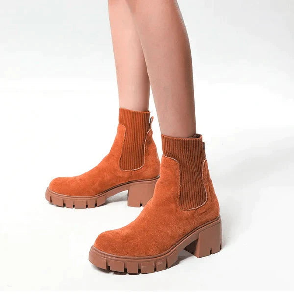 Women's black suede chunky heel winter boots with elastic slip-on band and durable rubber sole