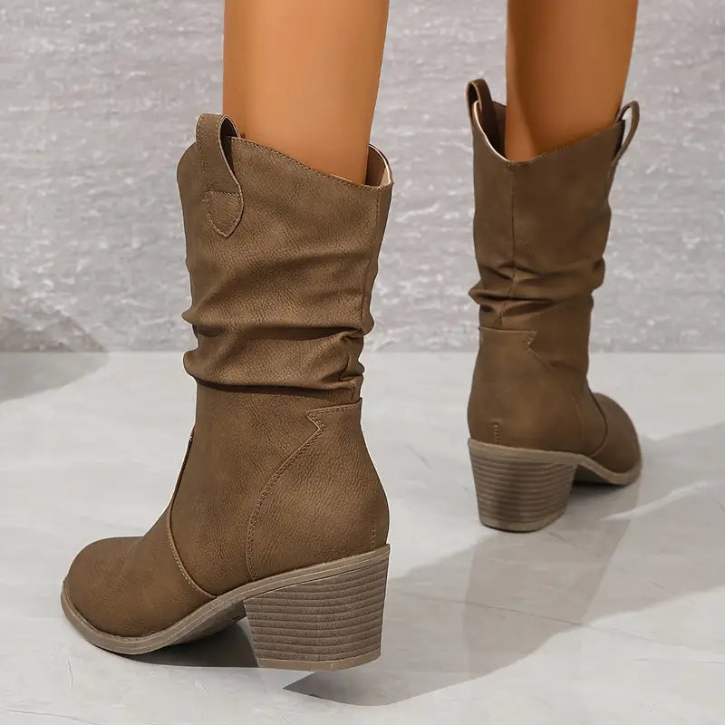 Women's brown chunky block heel slip-on boots with retro Western cowboy-inspired design