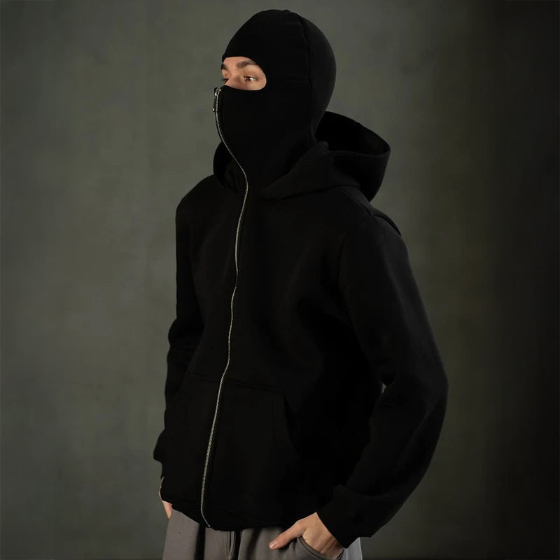 Black heavyweight zip hoodie with built-in balaclava mask, street armor urban style, full-zip closure