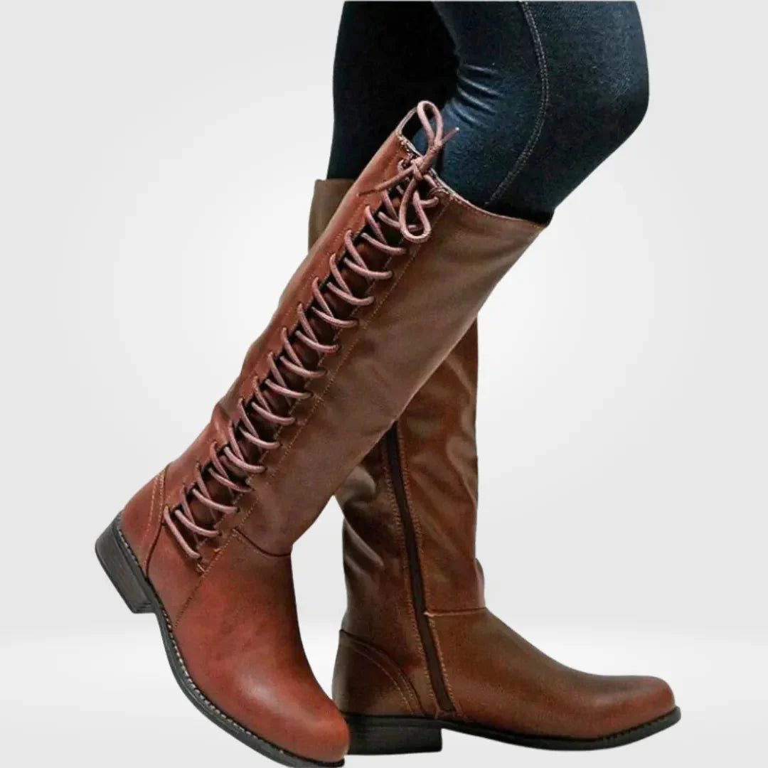 Women's black knee-high lace-up boots with side zip entry and sleek versatile silhouette