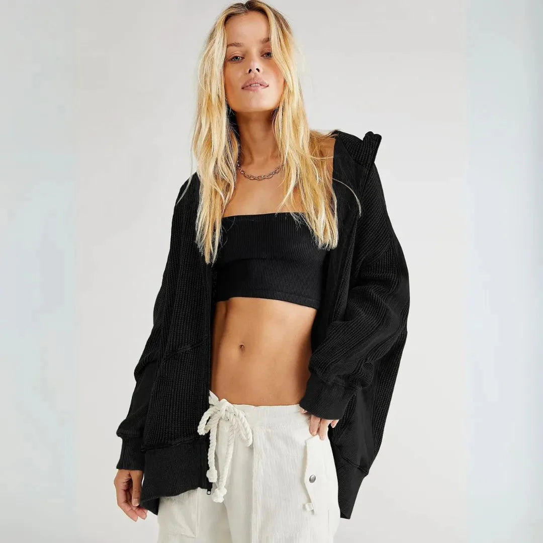 Women's oversized waffle knit zip hoodie in cloud soft neutral tones with relaxed fit and front pockets