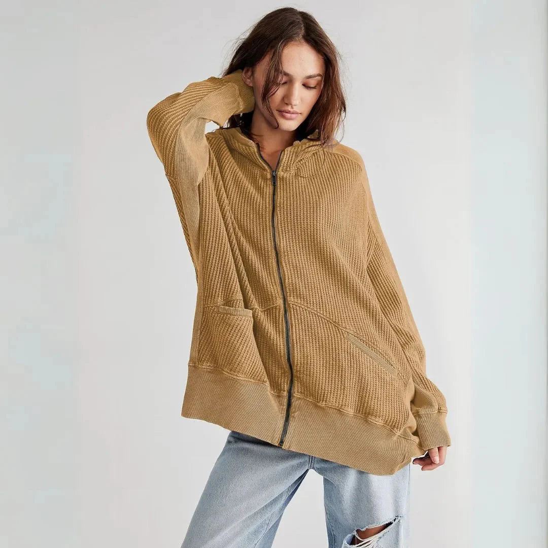 Women's oversized waffle knit zip hoodie in cloud soft neutral tones with relaxed fit and front pockets