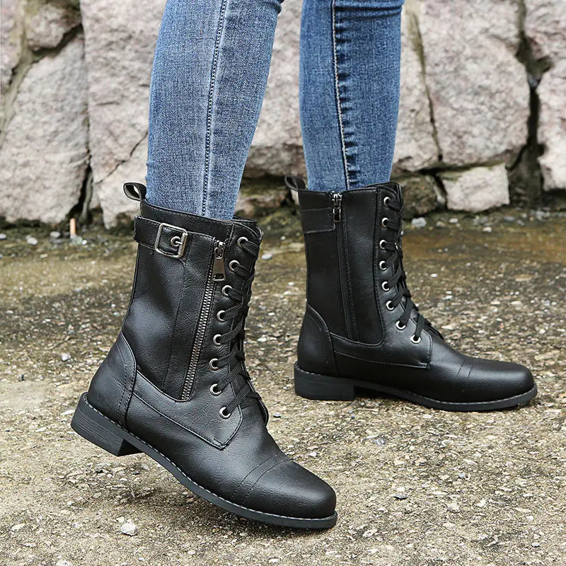 Black lace-up ankle boots for women, classic British silhouette with low heel synthetic leather