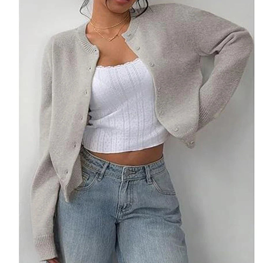 Pastel yellow women's classic knit cardigan with button front closure and ribbed trim