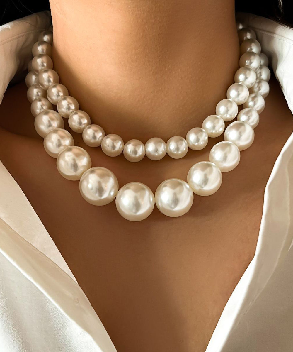 Collier élégant en acier inoxydable blanc avec perles et pompons - Urbann-Vibe
