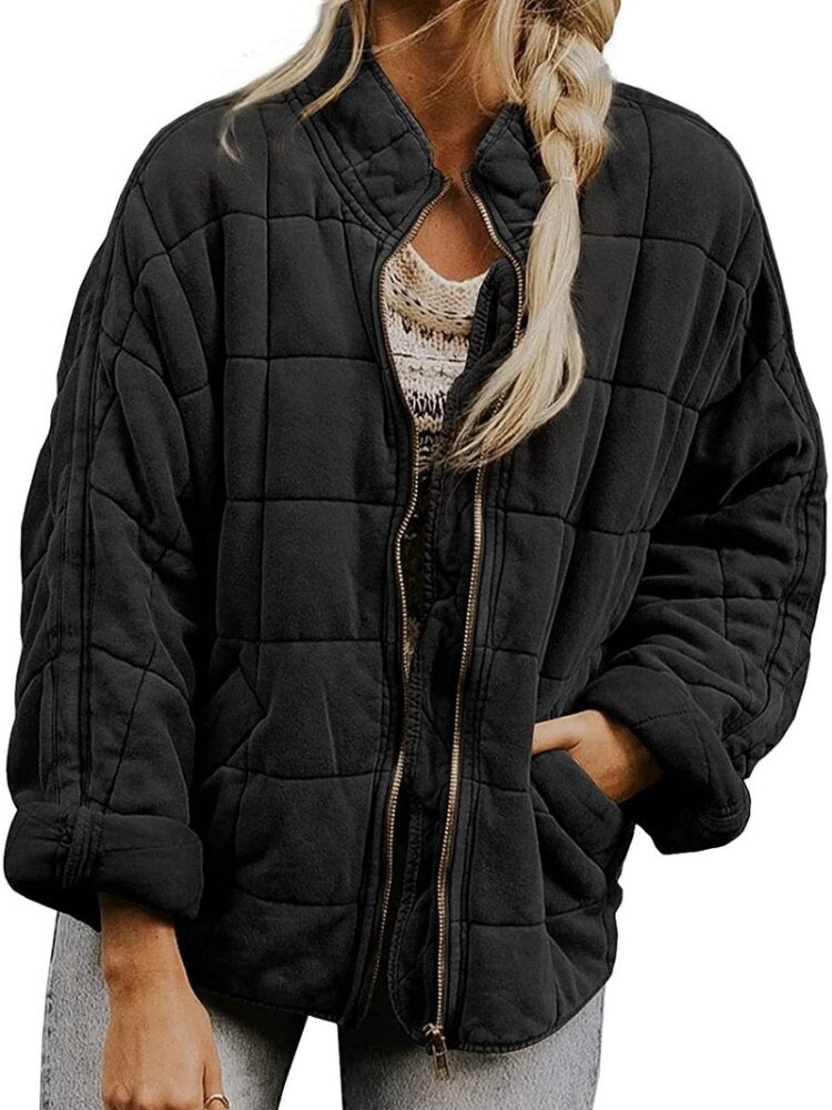 Black slim fit quilted jacket hip-length wind resistant with secure pockets for men and women