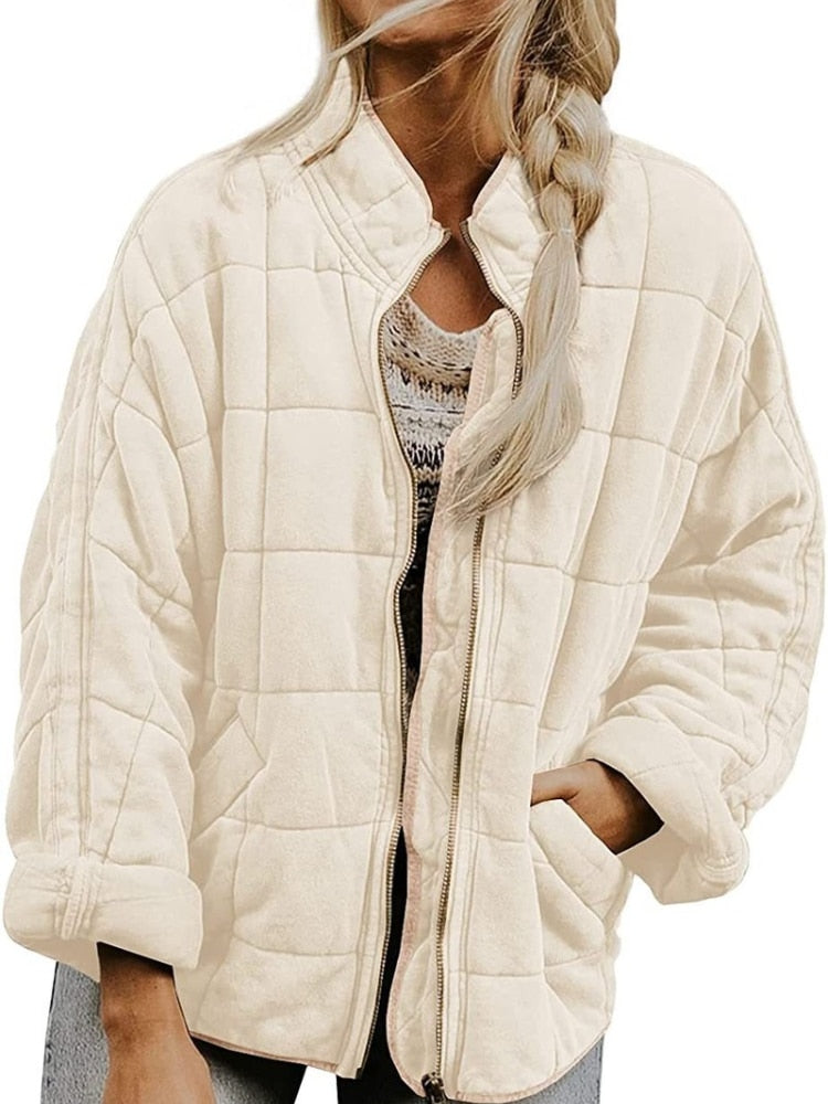Black slim fit quilted jacket hip-length wind resistant with secure pockets for men and women