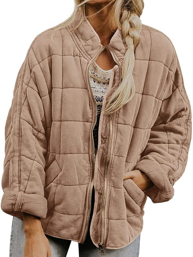 Black slim fit quilted jacket hip-length wind resistant with secure pockets for men and women