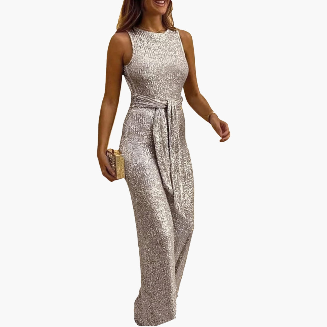 Women's silver sequined sleeveless jumpsuit with belted waist and wide-leg glitter pants