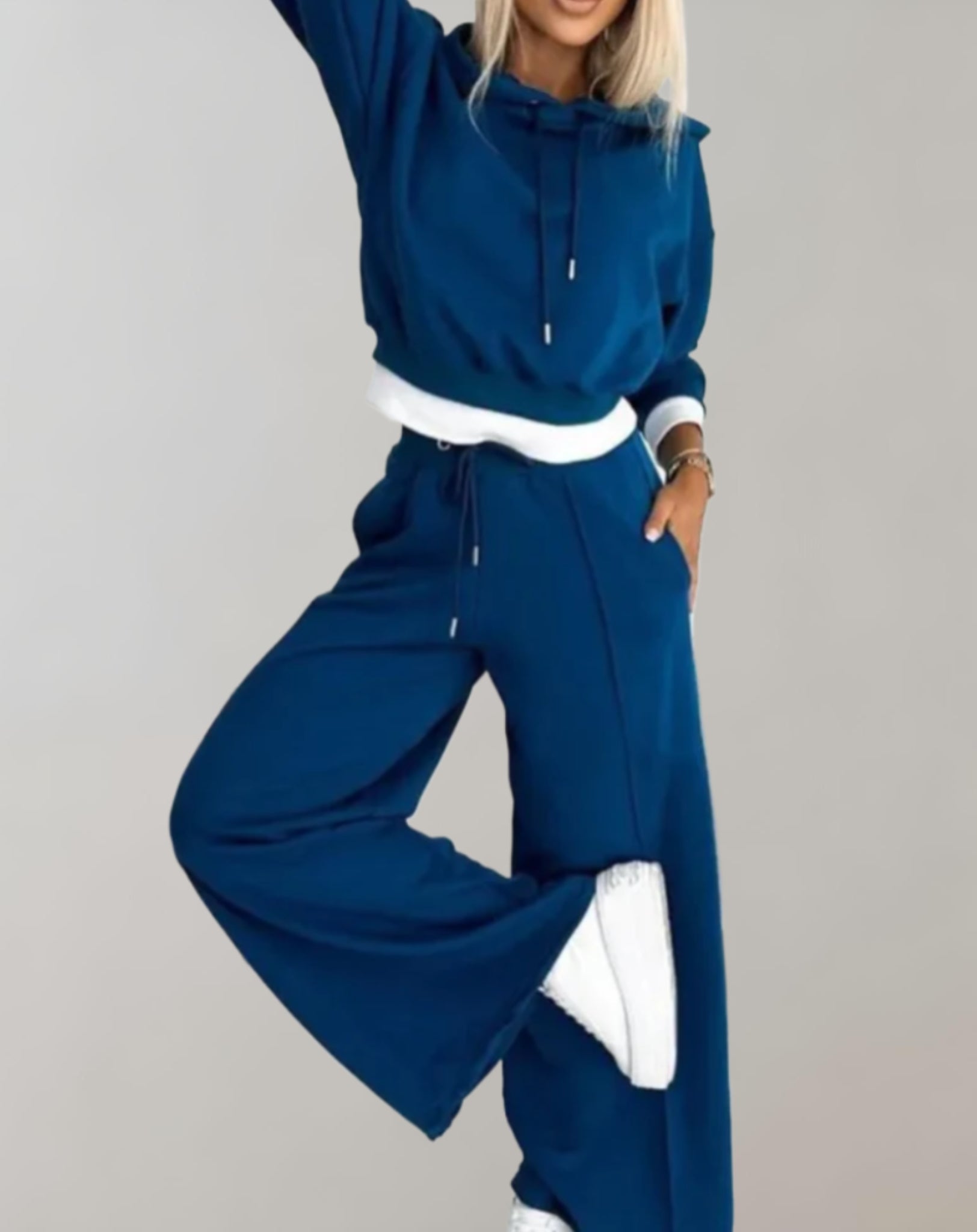 Women's casual hoodie tracksuit set in neutral tones, relaxed fit two-piece with matching drawstring pants