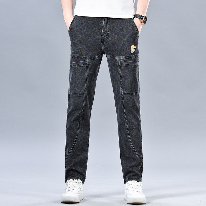 Corbin mid-rise tapered blue denim jeans with cargo detailing and unique contrast seam stitching
