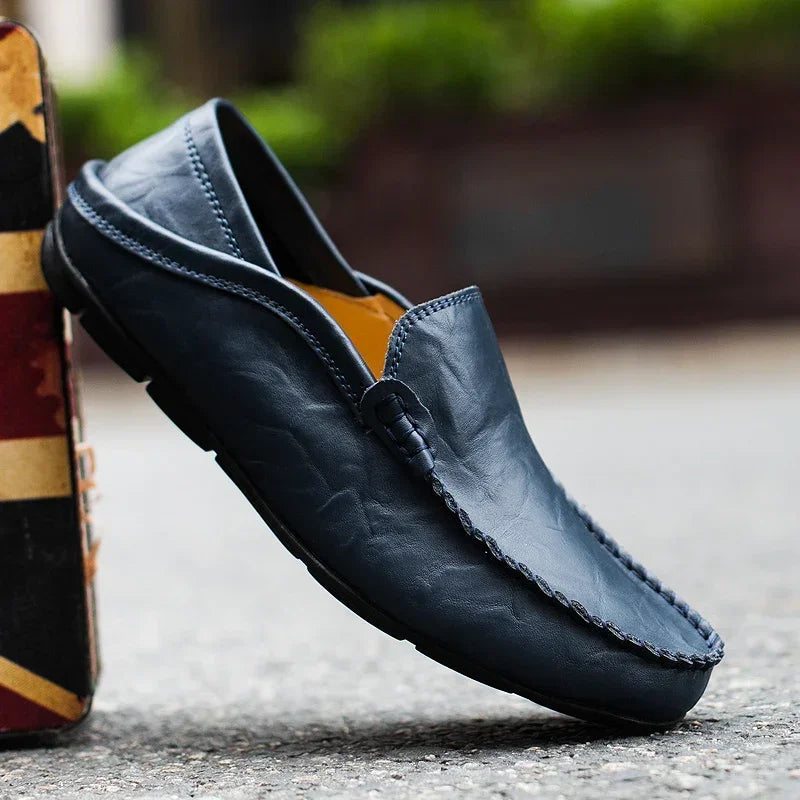 Cort tan leather loafer with hand-stitched detailing, lightweight breathable slip-on for urban professionals