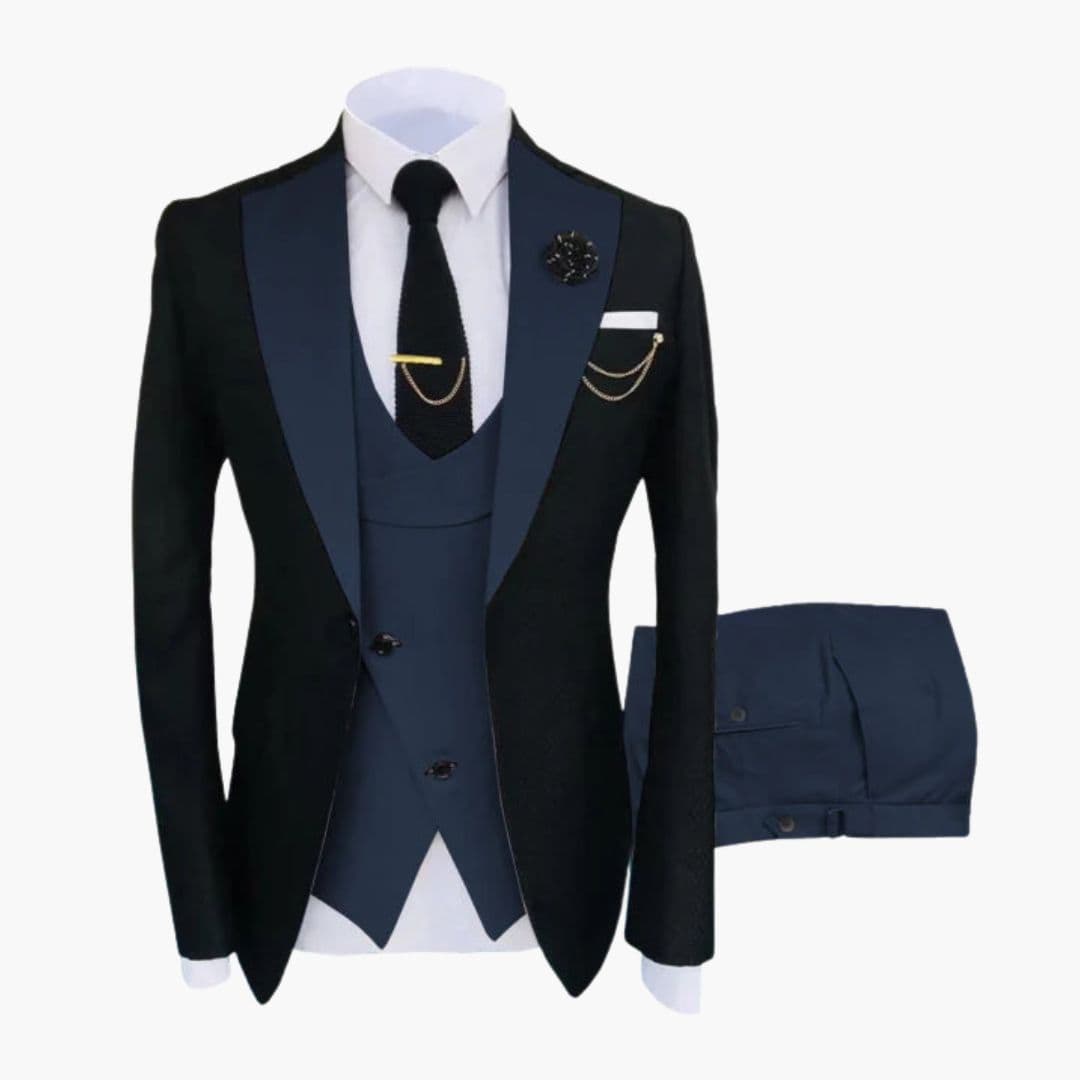 Men's black three-piece ceremonial suit with contrasting collar, buttoned vest, and gold chain accents